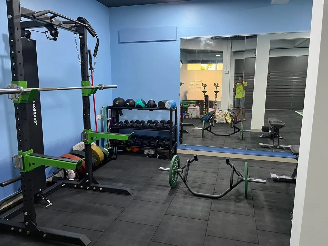 Trap bar, squat rack and dumbbells on the Kinetic Edge training floor